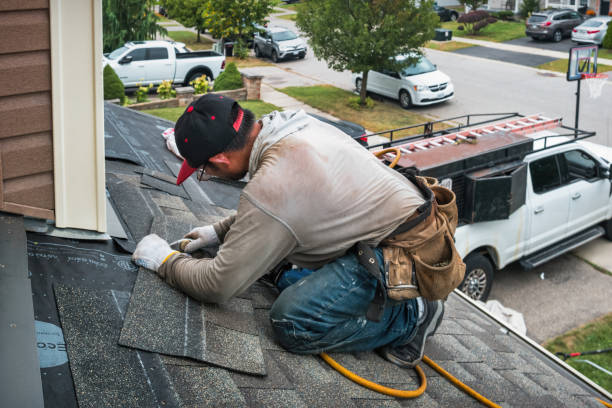Professional Flat Roof Repair technician working in Long Island, ME